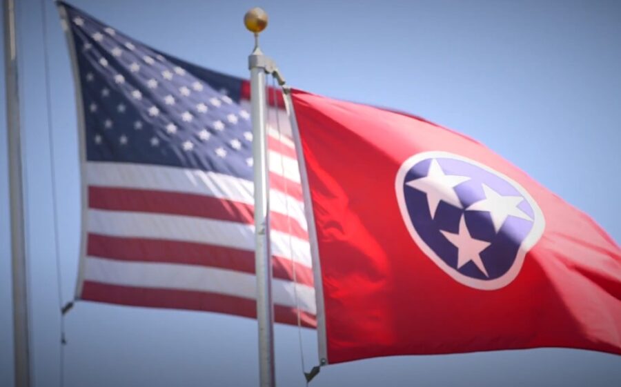 Tennessee and USA flags on a pole