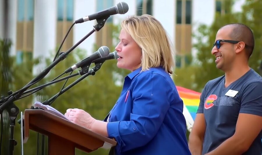 Cynthia Coffman giving a speech on one of the LGBTQ protests