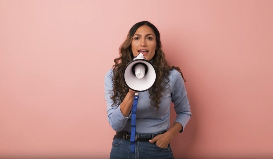 girl holdinf megaphone in one hand