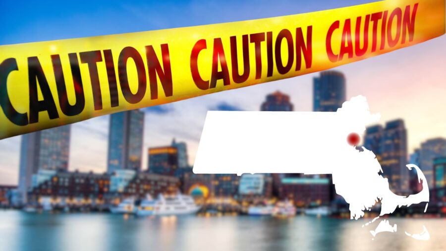 The Image Shows Boston's Waterfront Cityscape with Caution Tape and A Massachusetts State Outline Highlighting Boston, Suggesting a Warning About Crime or Safety Concerns in The City