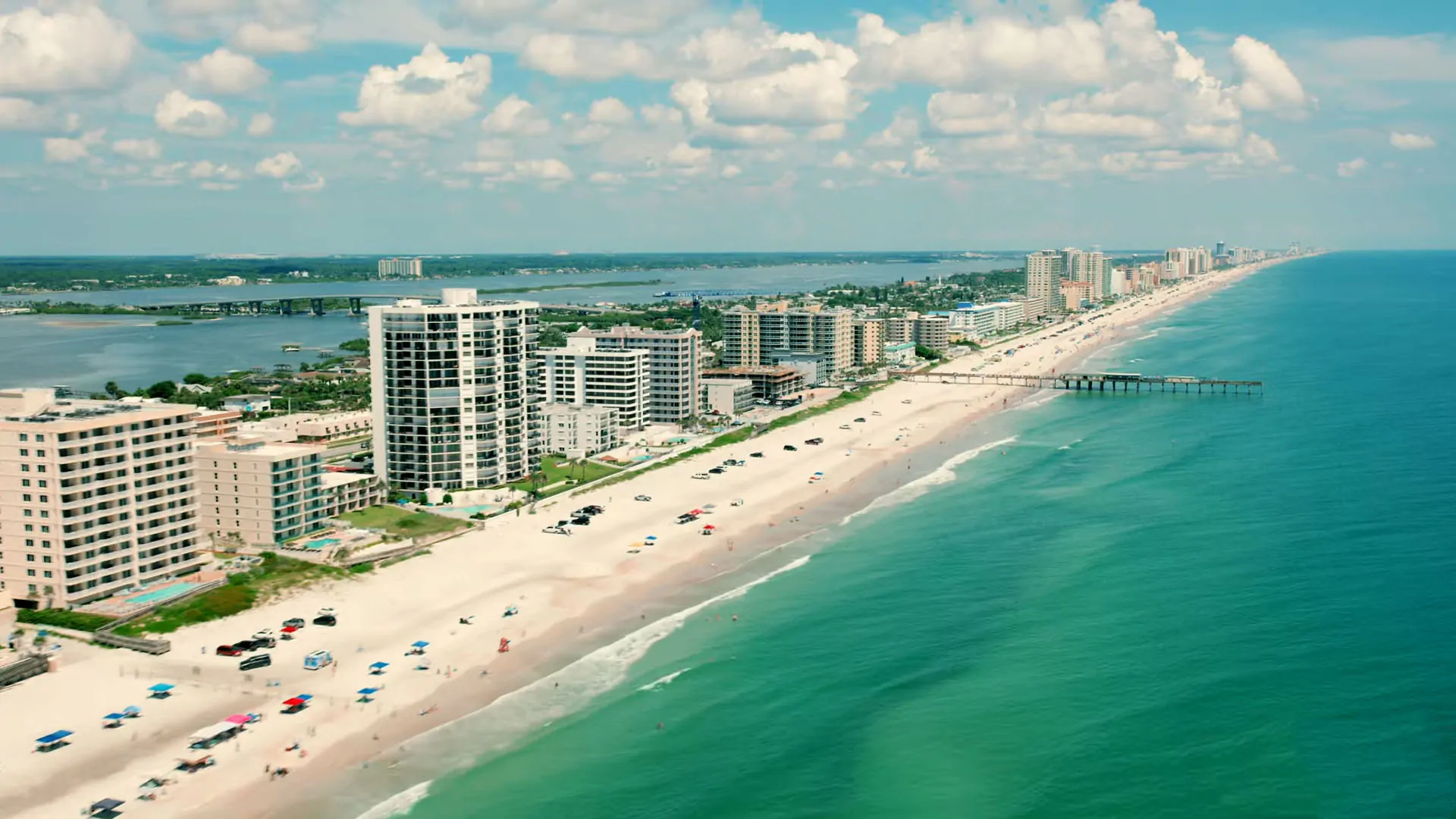 Florida beach with buildings, drone view