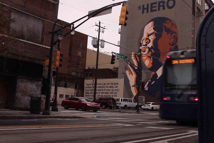 Mural of Congressman John Lewis on the building