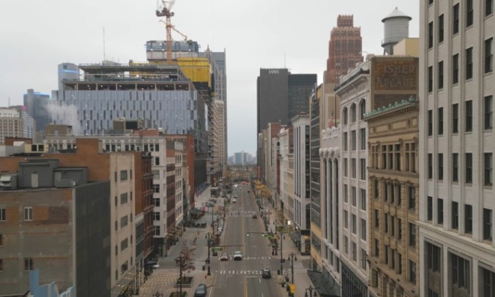 A panoramic view of a Detroit city street from a high-rise building