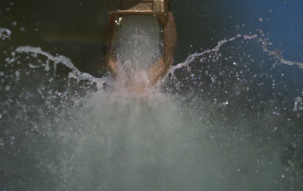 Sprinkler on a ceiling spreading water