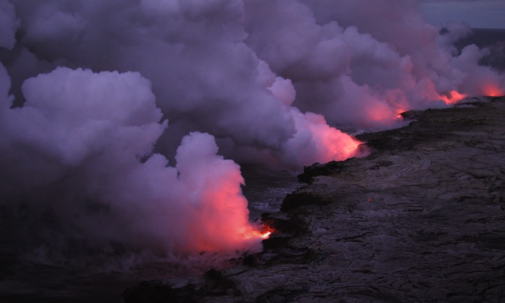 Smoke, fire, and lava caused by volcanic eruption