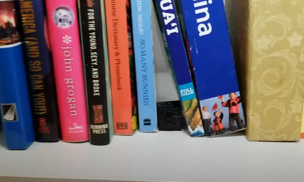 Camera hidden on a book shelf