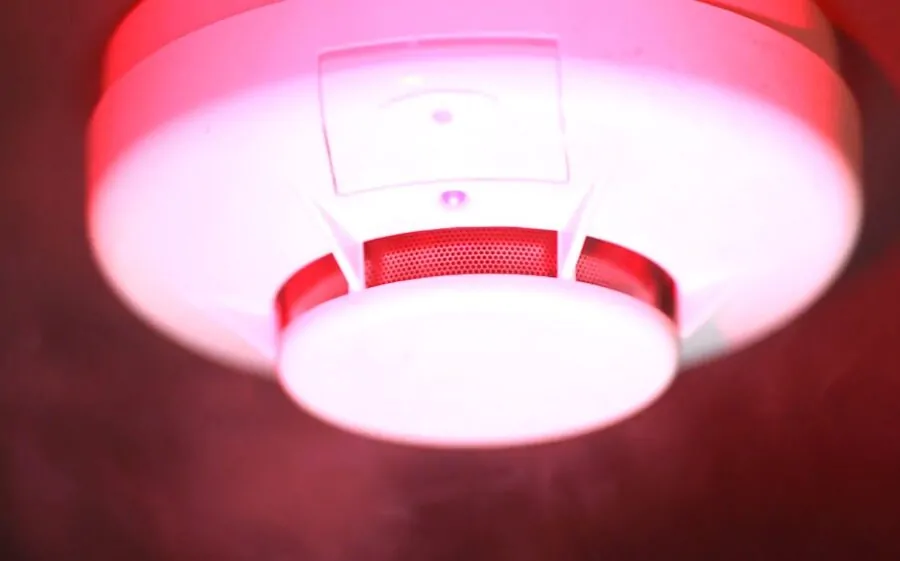 Smoke detector glows red 