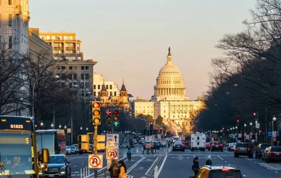 Traffic in Washington D.C. with White House in the distance