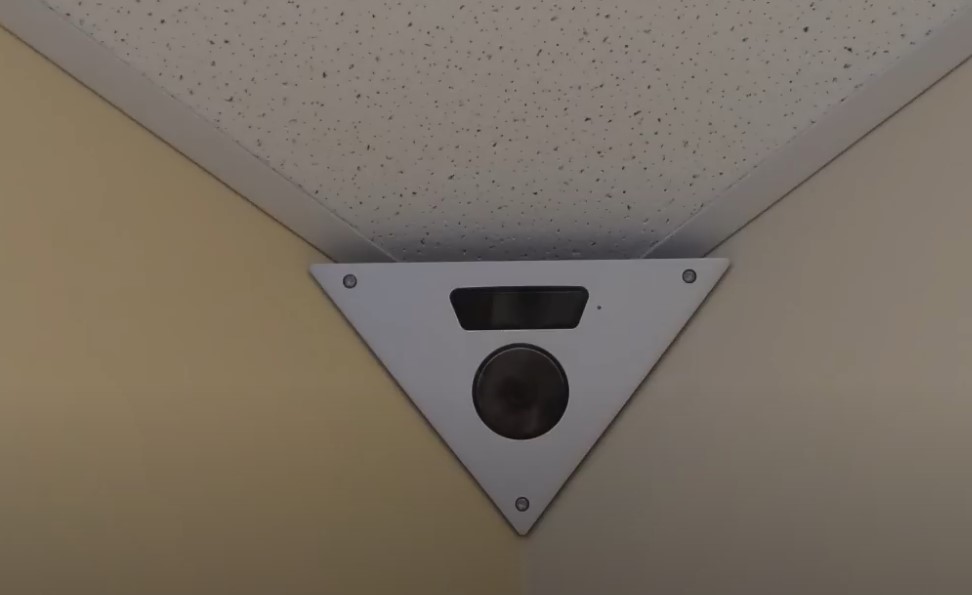 A CCTV camera in a corner of elevator