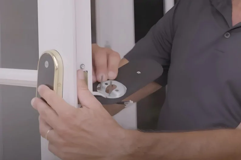 Person repairing a smart door lock