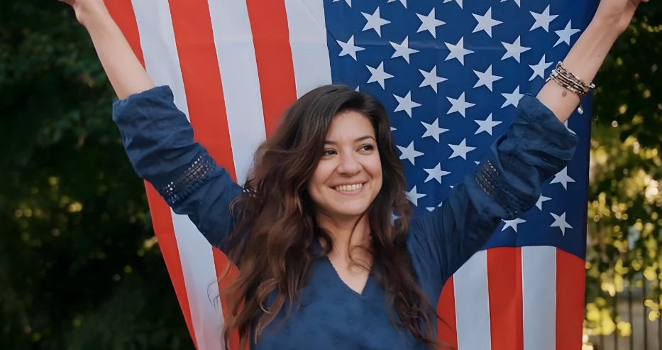 Woman holding American flag in her hands