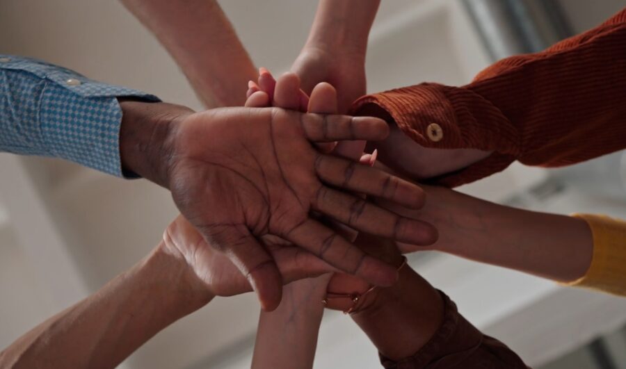 Diverse hands, united in purpose