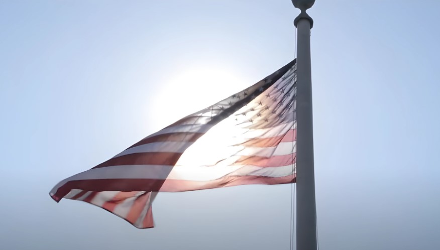 American flag waving on a pole