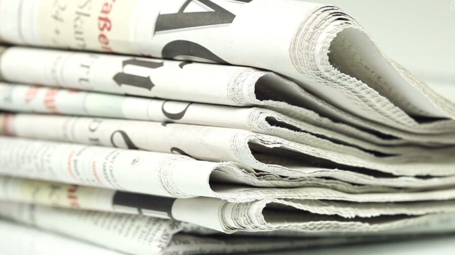 Close-up view of a stack of newspapers