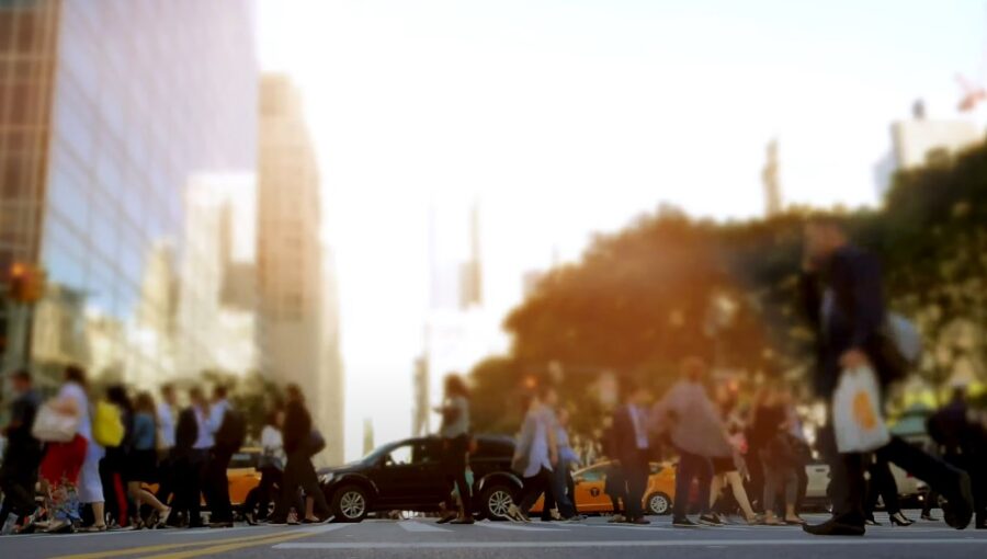 Pedestrians crossing a city street