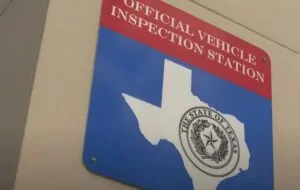 Sign that says "Official Vehicle Inspection Station"