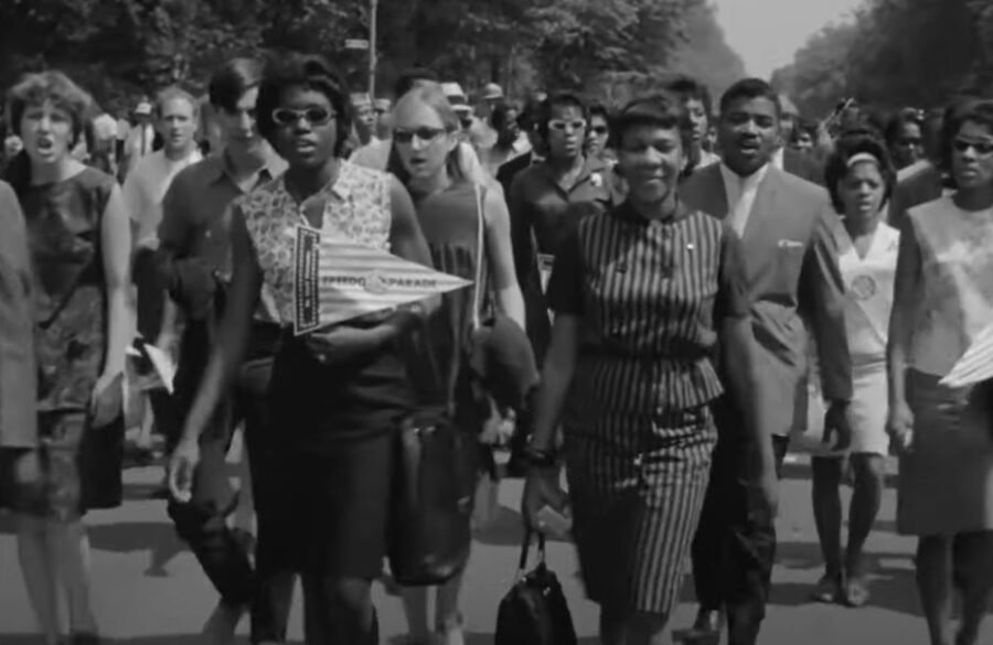 People protesting on the street for civil rights in 1964, black and white photo