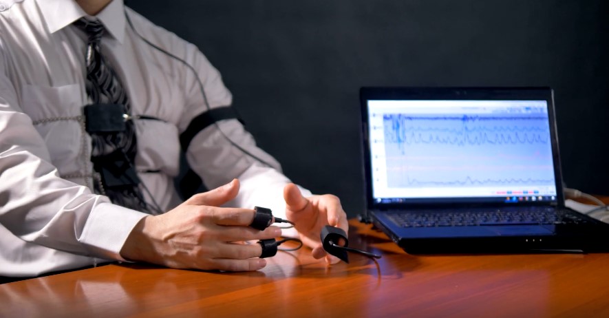 A man connected to a lie detector