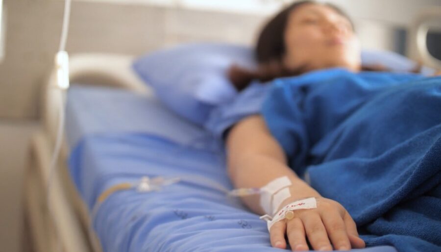 Patient resting comfortably in a hospital bed