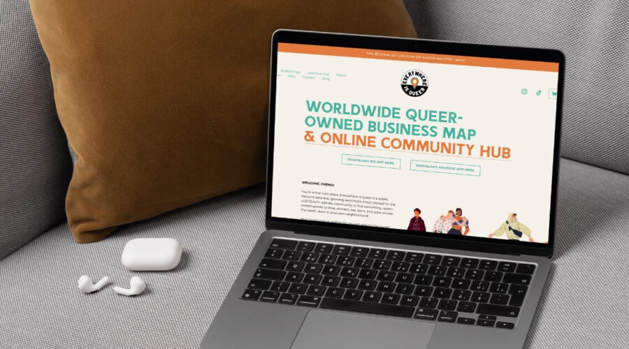 Everywhere is Queer website opened on a laptop