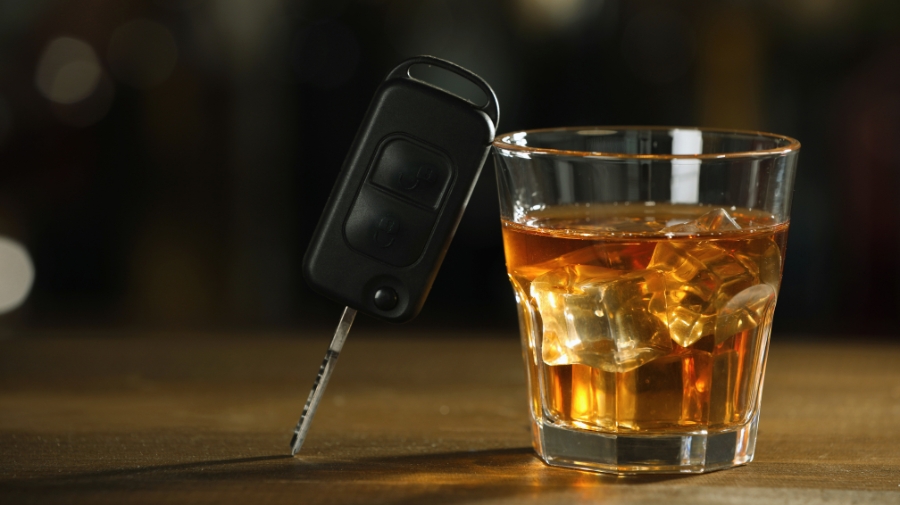 Car key and whiskey glass showing the issue - Is a DUI a felony or misdemeanor