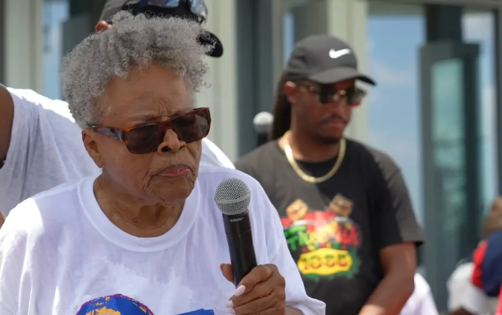 Opel Lee speaks at a Juneteenth gathering, sharing stories of struggle and hope that span generations