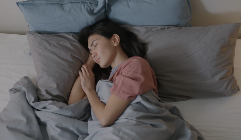 Woman sleeping in bed
