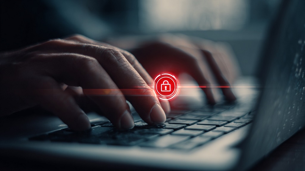Close-up of a login screen with warning symbol, illustrating account takeover risk