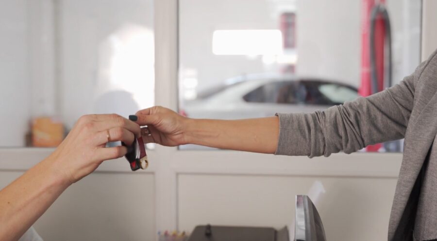 Car keys changing hands