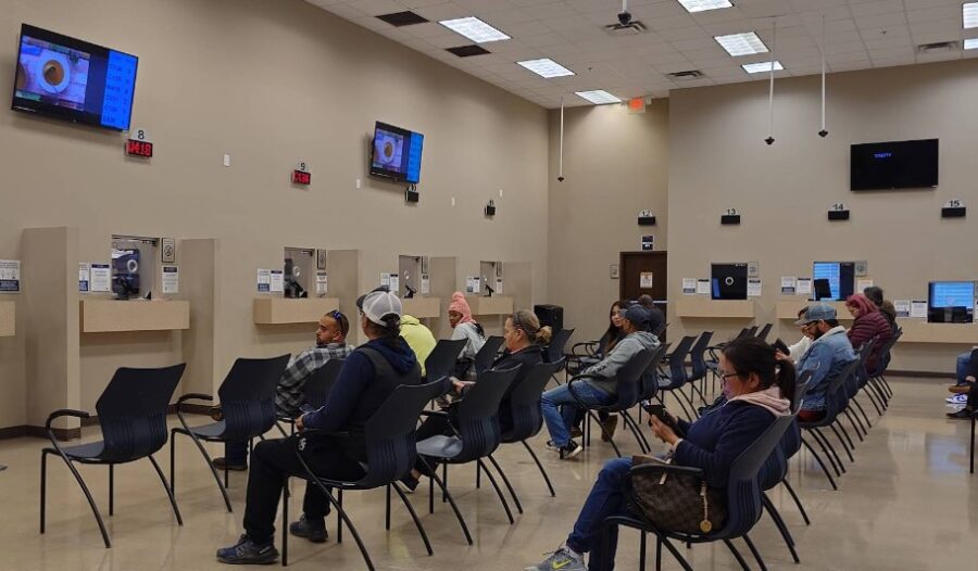 People waiting for car registration