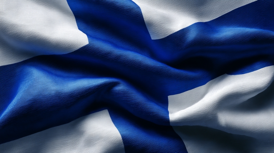 The Finnish flag with a blue cross on a white background