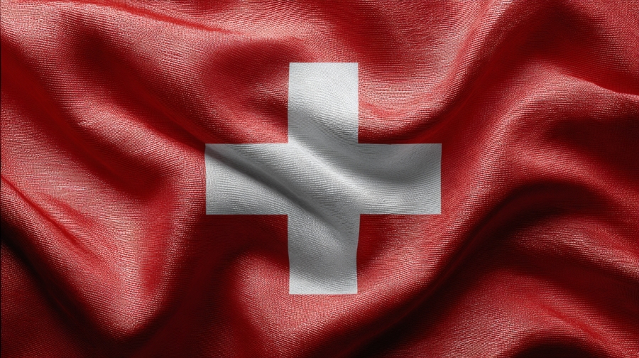 The Swiss flag with a white cross on a red background