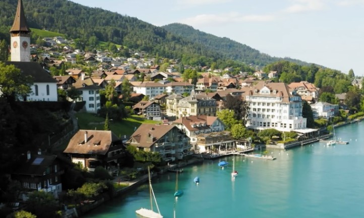 A picturesque Swiss town located on the edge of a serene lake