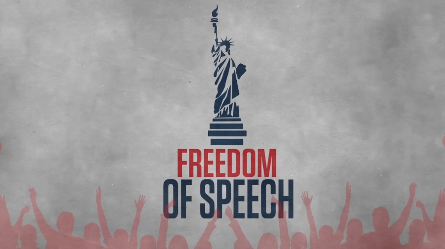 An illustration of the Statue of Liberty above the words “Freedom of Speech” with silhouettes of people raising their hands