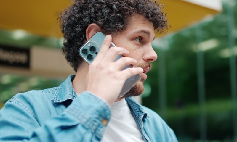 Man calling 911 on his cellphone