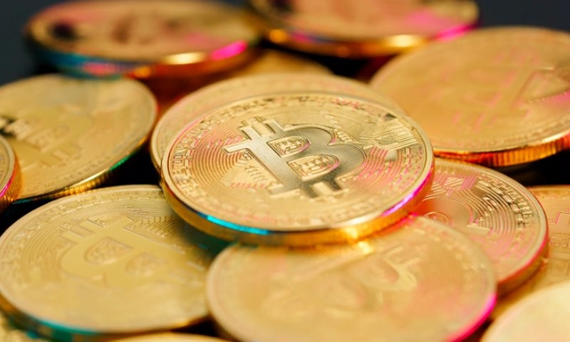 Stack of bitcoins, close up photo