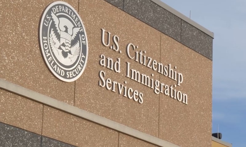 US Citizenship and Immigration Services logo featuring an eagle and shield