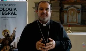 Dom Arnaldo Carvalheiro Neto speaks in front of a camera