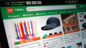 Arizona Attorney General lawsuit headline shown over Temu app interface on a mobile screen