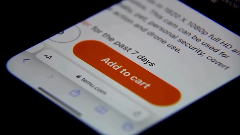 Close-up of a Temu product page with an Add to Cart button on a smartphone