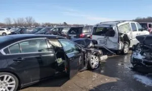 Damaged cars parked in a lot