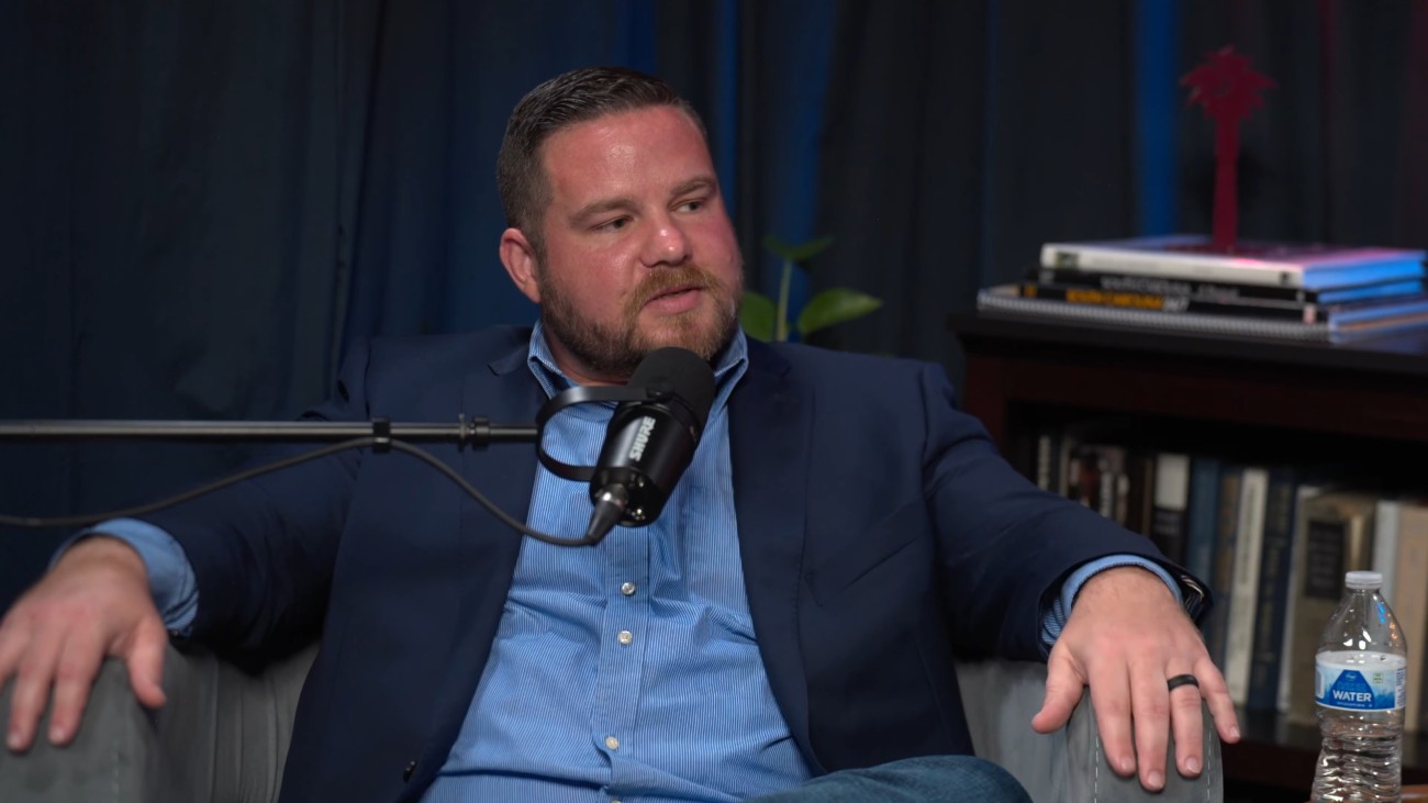 Robert John “RJ” May III talks during an interview