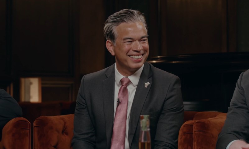 Rob Bonta smiling during a podcast