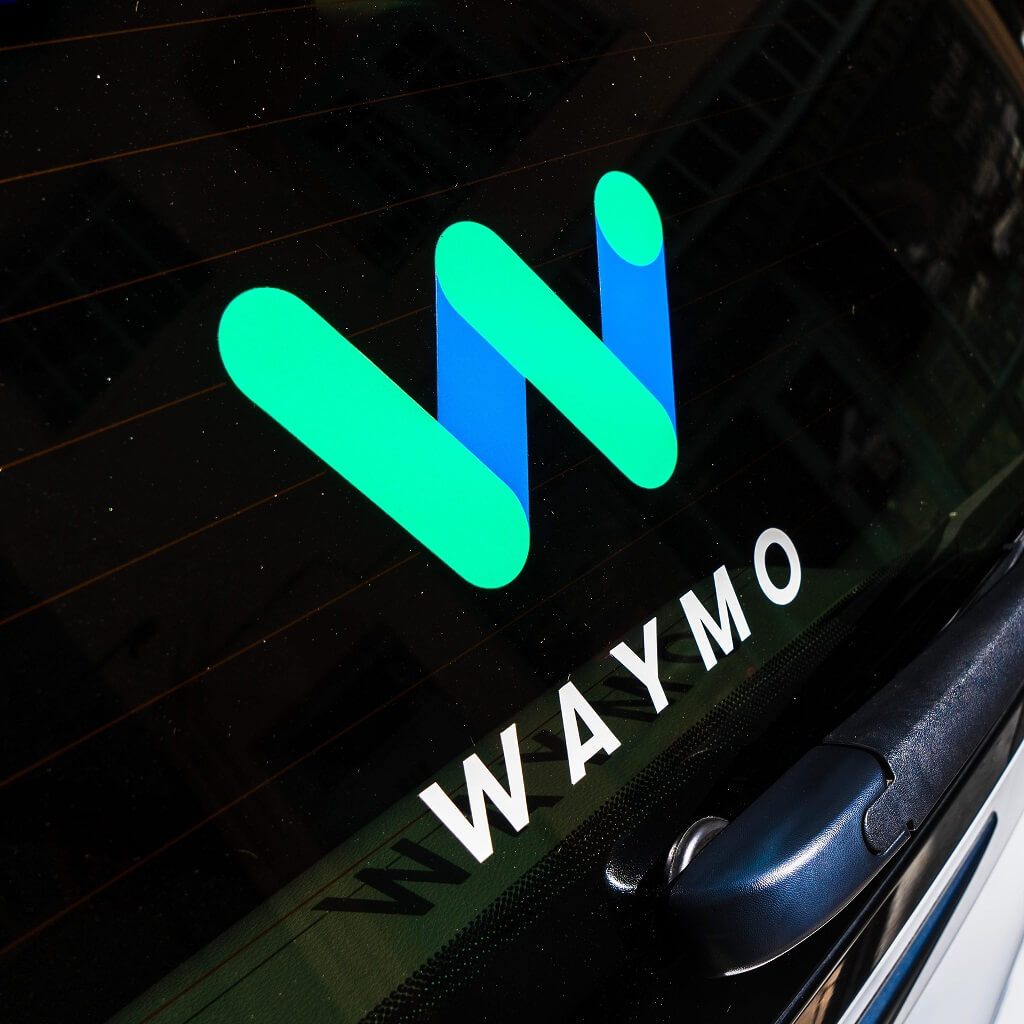 Waymo logo on an autonomous vehicle